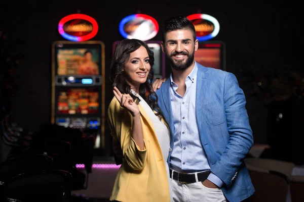 Portrait Young Beautiful Well Dressed Couple Playing Casino Showing Finger — Stock Photo, Image