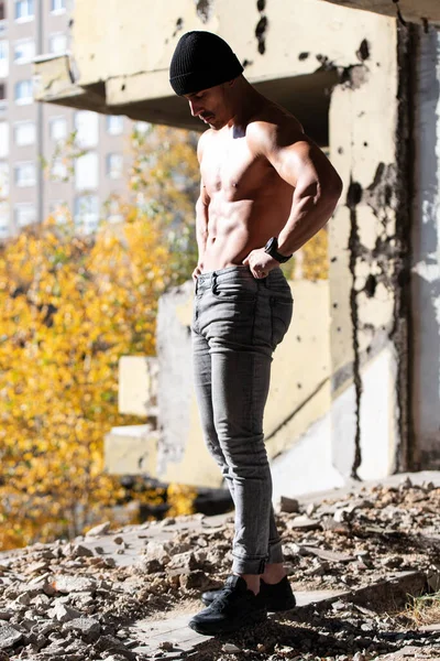 Handsome Young Man Standing Strong Outdoors Flexing Muscles Ruins Muscular — Stock Photo, Image
