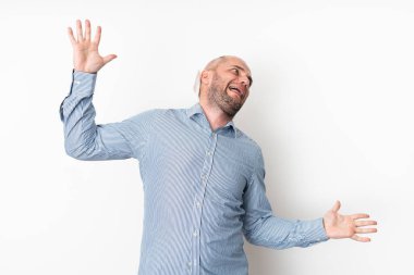 Studio Portrait of an Angry Man After Hair Transplant Failure clipart