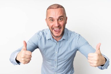 Happy Man Giving Thumbs Up After Hair Transplant Surgery clipart