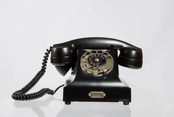 古い電話隔離された白い背景 — ストック写真