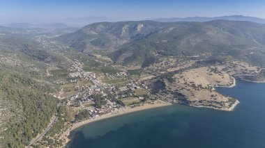 Aerial view over Ahmetbeyli coastal resort town in Menderes district of Izmir province in Turkey. clipart