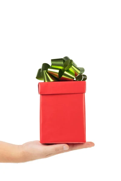 Hand Holds Red Gift Box Green Ribbon Bow Isolated White — Stock Photo, Image