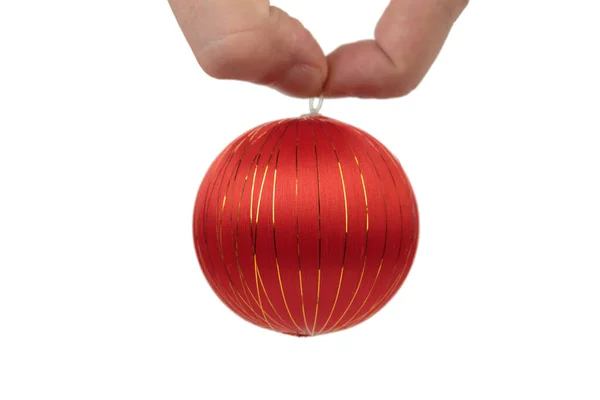 Hand Holds Red Christmas Ball Isolated White Background Close — Stock Photo, Image