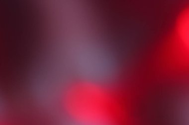 Renkli kırmızı ve siyah soyut arkaplan. Bu arkaplan bir insan palmiyesi tarafından şeffaflık sonucu elde edilmiştir..