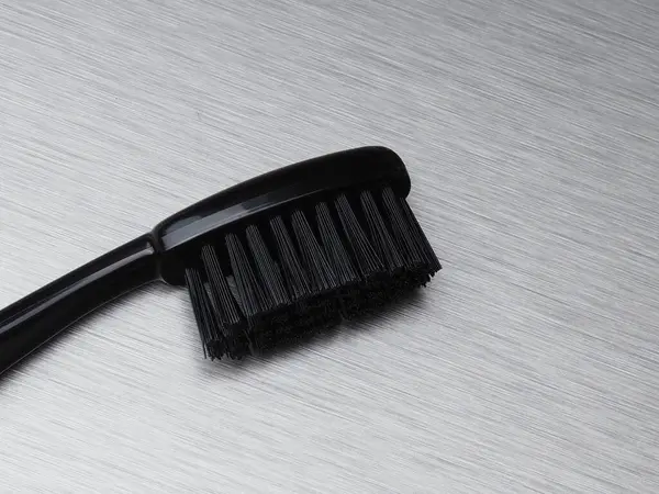 Black Toothbrush Black Bristles Metal Background Close — Stock Photo, Image