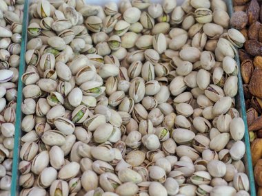 Kabuksuz Fıstıkların Yakın Çekimi: Doğal Enerji ve Neşeli Ruh Halinin Sembolü