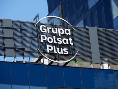 Grupa Polsat Plus Modern Office Building Facade on Reflective Glass Mimari Şirketi Logosu