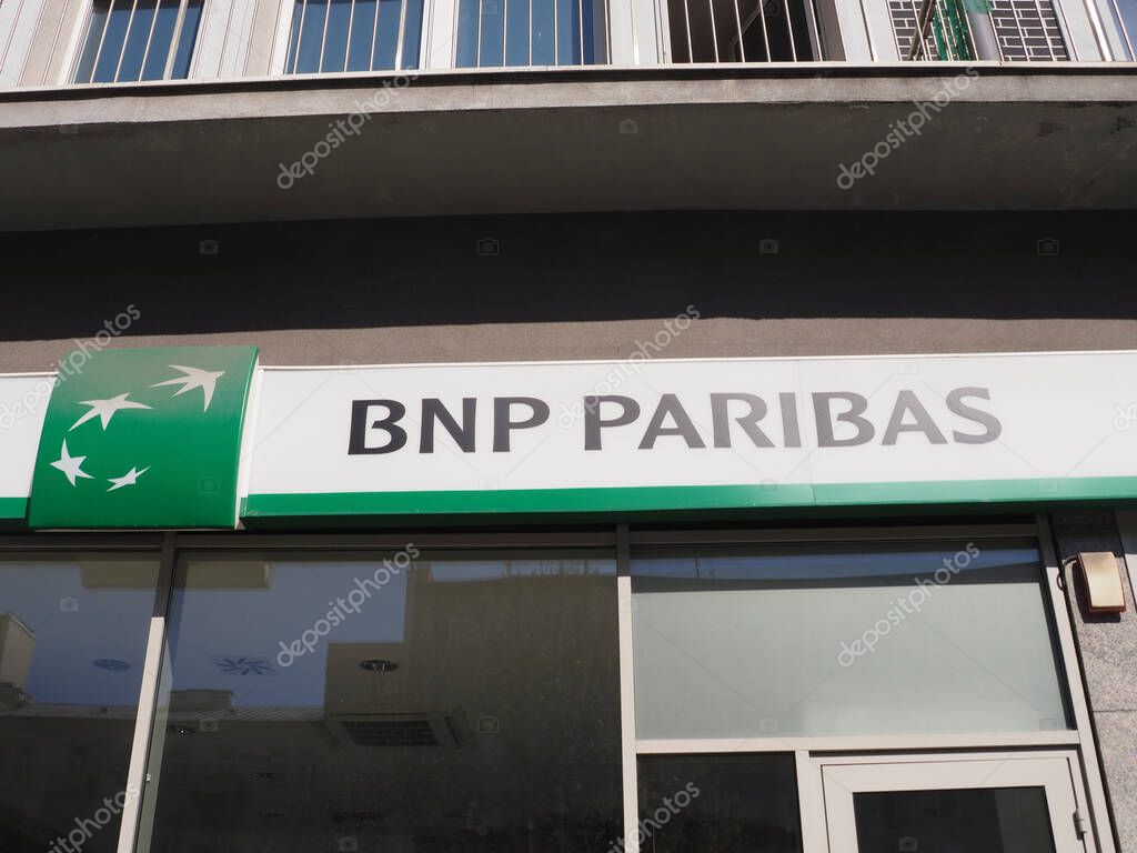 BNP Paribas Bank Branch with Green and White Logo on Modern Building Facade in Urban Setting