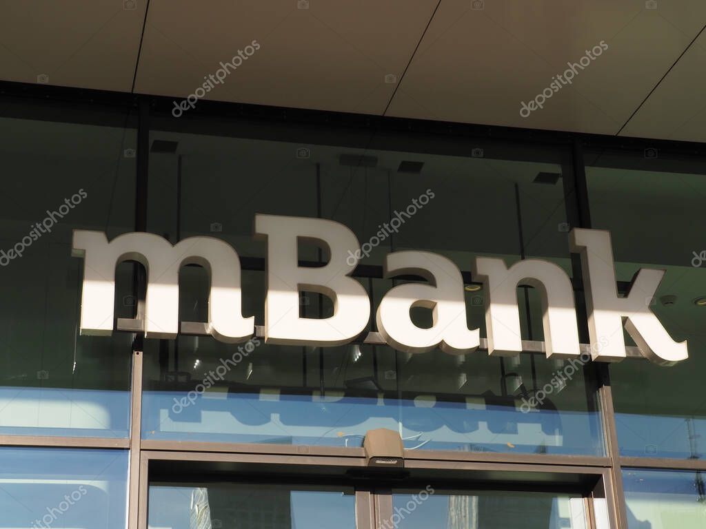 Modern mBank Corporate Sign on Glass Office Building Entrance Reflecting Contemporary Financial Institution Branding