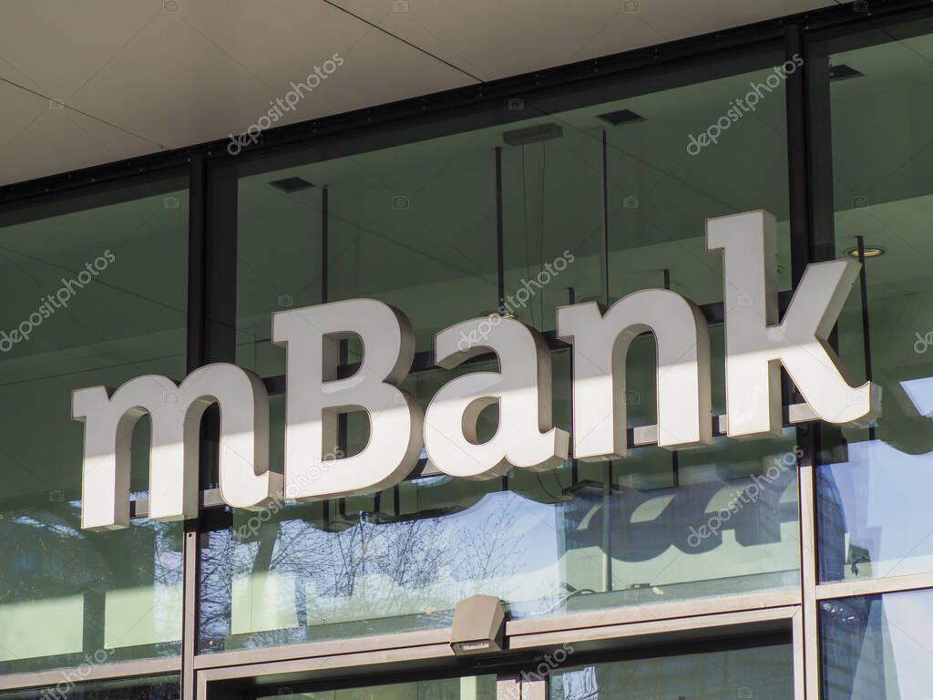 Modern mBank Corporate Sign on Glass Facade of Urban Financial Center in Daylight