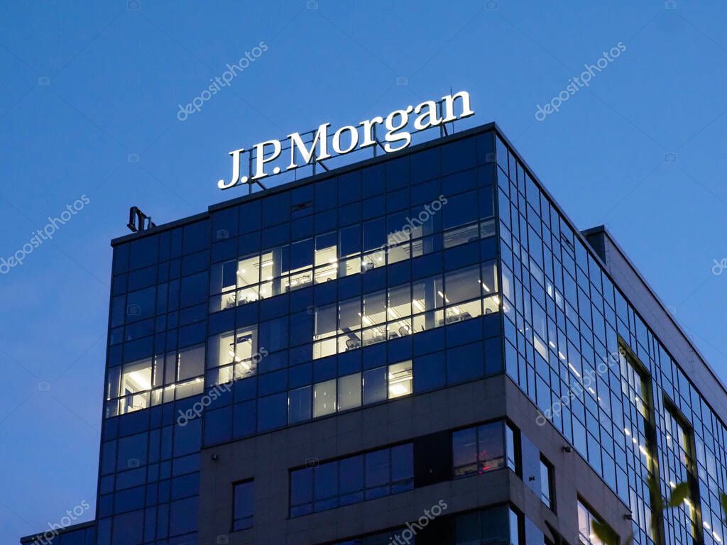 J.P. Morgan Corporate Building with Illuminated Logo Against Twilight Sky