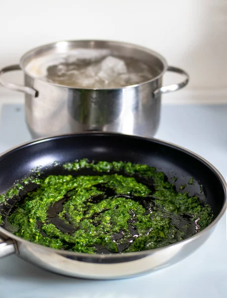 Pasta with pesto.Cooking process step by step in the kitchen. High quality photo