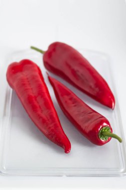 Sweet red kappa peppers isolated on white background. High quality photo.