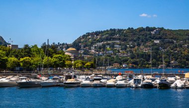 Street and lake views of Como city at the southern tip of Lake Como in northern Italy. High quality photo