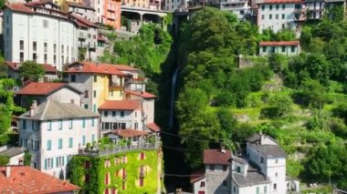 Aerial view of Nesso, a picturesque village sitting on the banks of Lake Como, Italy