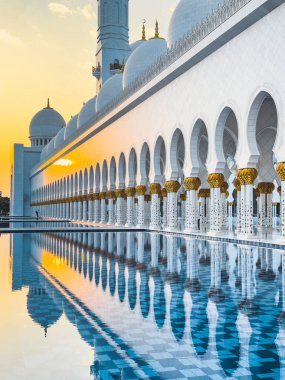 The Sheikh Zayed Grand Mosque during sunset, in Abu Dhabi, United Arab Emirates. High quality photo