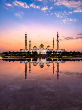 The Sheikh Zayed Grand Mosque during sunset, in Abu Dhabi, United Arab Emirates. High quality photo