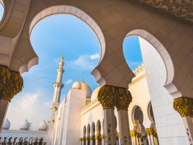 Sheikh Zayed Grand Mosque hallway corridor during sunset, in Abu Dhabi, United Arab Emirates. High quality photo