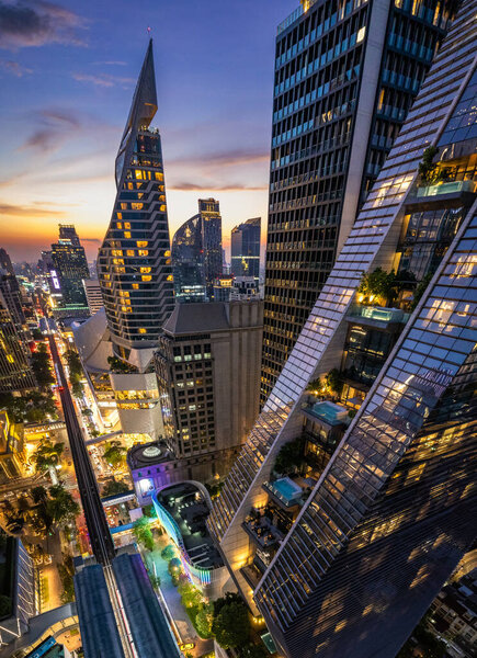 Aerial view of Ploenchit road by night in Bangkok Downtown, financial district and business center, Thailand, south east asia