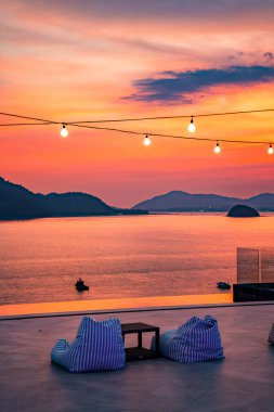 View of rooftop bar in Panwa beach at sunset, in Phuket, Thailand, south east Asia