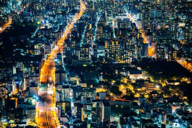 Japonya 'daki Abeno Harukas Binası' ndan geceleri Osaka manzarası. Yüksek kalite fotoğraf