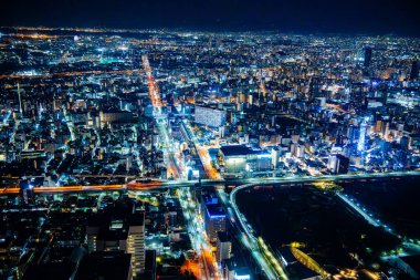 Japonya 'daki Abeno Harukas Binası' ndan geceleri Osaka manzarası. Yüksek kalite fotoğraf