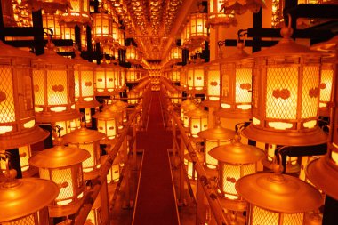 In front of the mausoleum of Kobo Daishi is Torodo Hall, the Hall of Lanterns, which is the center of worship for Okunoin. The hall contains more than 10,000 lanterns which are kept eternally lit clipart