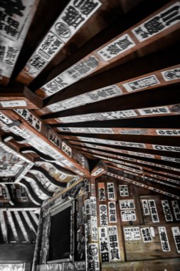 Sazae Temple. Wooden temple from 1796 with a unique double helix structure and a spiral staircase. clipart