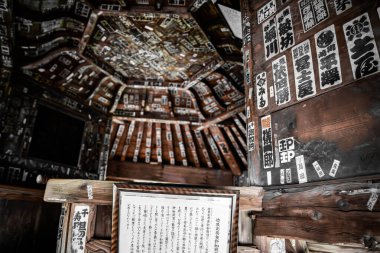 Sazae Temple. Wooden temple from 1796 with a unique double helix structure and a spiral staircase. clipart