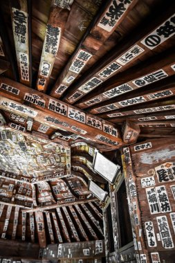 Sazae Temple. Wooden temple from 1796 with a unique double helix structure and a spiral staircase. clipart