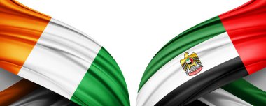 Fildişi kıyılarının iki ipek bayrağı ve beyaz bir arkaplanda birleşik Arap emirlikleri.