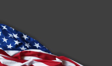 Gri arka planda dalgalanan Amerikan bayrağı