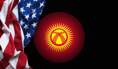 Kırgızistan 'ın ulusal simgesi hafifçe sallanan ABD bayrağının yanında