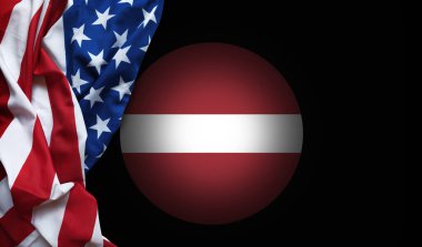 Letonya 'nın ulusal simgesi hafifçe sallanan ABD bayrağının yanında