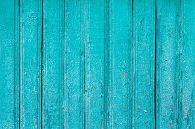 Eski ahşap dokusunda mavi çatlak boya. Eski ahşap ahşap akuamarin duvar arkaplanı. Ahşap tahta arkaplan