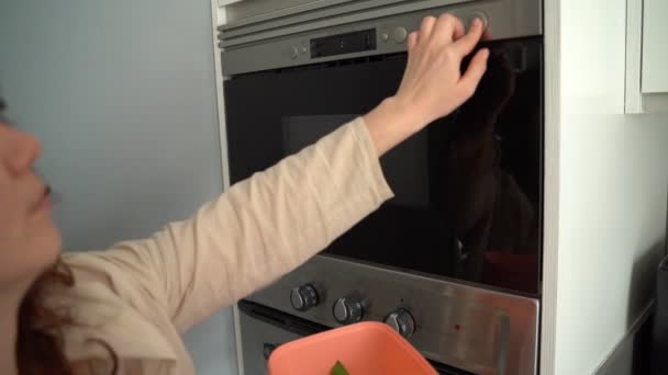 Woman Using Microwave Oven Putting Pink Lunch Box Warm Her — Stock Video
