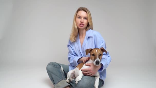 Blonde Woman Sitting Floor Pet Dog Jack Russell Terrier Her — Stock Video