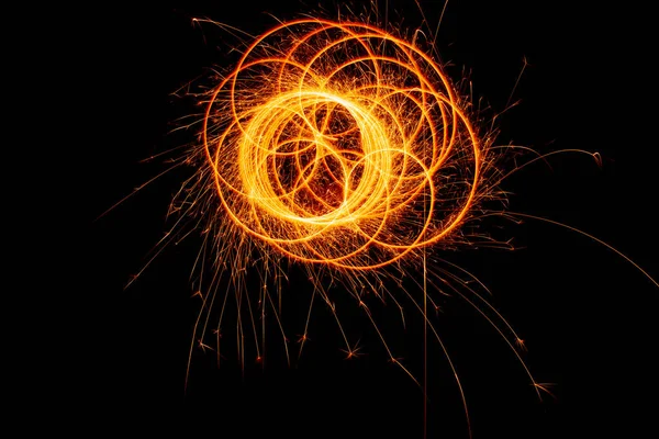 黒い背景に火花と円 祝祭の輝き 新年の抽象的な光 — ストック写真