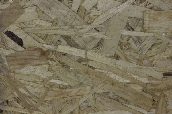 Plywood background. A board made of glued pieces of wood