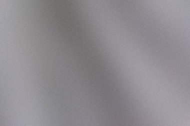 Yüksek çözünürlüklü görüntü kumlu gri bir doku arkaplanı içerir