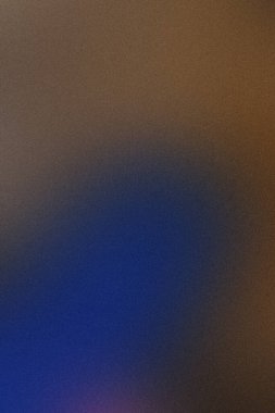 Maviden kahverengiye geçiş yapan taneli desenli canlı bir arkaplan