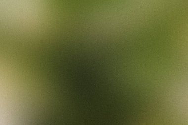 Kum tanecikli arka plan yeşil ve sarı renklerin karışımını gösteriyor.