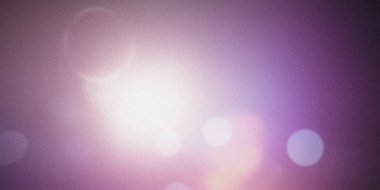 Soyut arkaplanda Bokeh ışıkları neşeli bir atmosfer yaratıyor