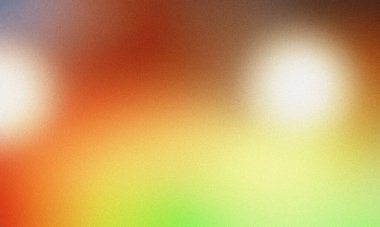 Yeşil, turuncu, sarı ve beyaz renkleri harmanlayan taneli bir gradyan içeren soyut arkaplan