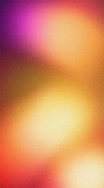 stock image Abstract blurred background featuring a grainy gradient in warm tones of orange, pink, and yellow