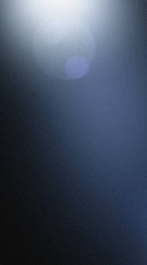 Mavi bulanık bir daire oluşturan ışık demeti ile soyut bulanık arkaplan