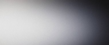 Işık ince bir eğimle desenli metalik bir yüzeyde kaybolur.