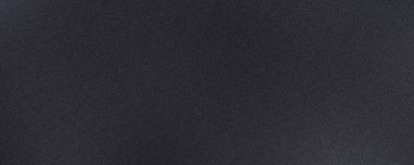 Yüksek çözünürlüklü fotoğraf, pürüzlü bir efektle örtülmüş parlak bir gradyan dokusunu gösteriyor.