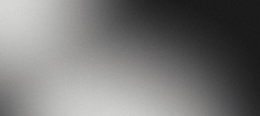 Bulanık açık gri arkaplan. Hassas kumlu dokular koyu tonlara karışıyor.